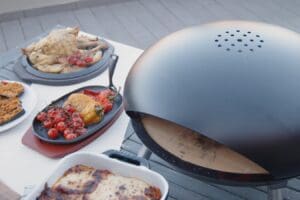 De mobiele Crosti Clementi pizzaoven zowel buiten als binnen toepasbaar.