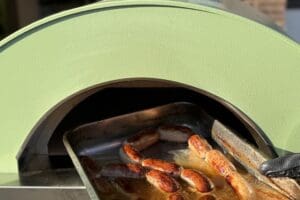 Ovenschaal met worstjes in Clementi Remida Plus gasoven