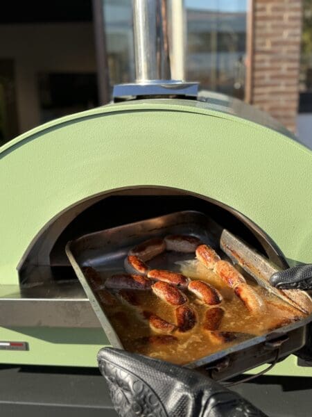 Ovenschaal met worstjes in Clementi Remida Plus gasoven